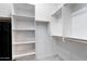 Large walk-in closet with shelving and hanging rods at 5063 E Reavis St, Apache Junction, AZ 85119