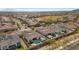 Aerial view of house and neighborhood with golf course at 5252 N 206Th Dr, Buckeye, AZ 85396