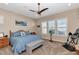 Relaxing main bedroom with a comfortable bed and plenty of natural light at 5252 N 206Th Dr, Buckeye, AZ 85396