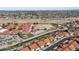 Aerial view of community, highlighting homes and school at 5582 W Aster Dr, Glendale, AZ 85304