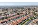 Wide aerial view of neighborhood, showcasing homes and landscaping at 5582 W Aster Dr, Glendale, AZ 85304