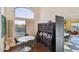 Small breakfast nook with white table and dark wood hutch at 5582 W Aster Dr, Glendale, AZ 85304