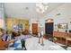 Elegant dining room with hardwood floors and statement wallpaper at 5582 W Aster Dr, Glendale, AZ 85304