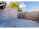 Private backyard with a storage shed and gated access at 600 S Dobson Rd # 166, Mesa, AZ 85202