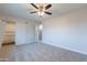 Spacious bedroom with carpet flooring and ample closet space at 600 S Dobson Rd # 166, Mesa, AZ 85202