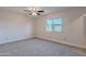 Well-lit bedroom with carpet flooring and a window at 600 S Dobson Rd # 166, Mesa, AZ 85202