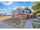 Two-story stucco building with a gated entry and landscaped yard at 600 S Dobson Rd # 166, Mesa, AZ 85202