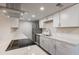 Modern kitchen featuring white cabinets, quartz countertops, and stainless steel appliances at 600 S Dobson Rd # 166, Mesa, AZ 85202