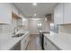 Modern kitchen with white cabinets and stainless steel appliances at 600 S Dobson Rd # 166, Mesa, AZ 85202