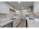 Modern kitchen featuring white cabinets and quartz countertops at 600 S Dobson Rd # 166, Mesa, AZ 85202