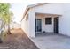 Covered patio with concrete slab and small backyard at 7456 W Greer Ave, Peoria, AZ 85345