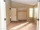 Simple bedroom with neutral walls and carpet flooring at 7456 W Greer Ave, Peoria, AZ 85345