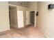 Well-lit bedroom with access to bathroom at 7456 W Greer Ave, Peoria, AZ 85345