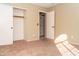 Bedroom with double door closet and carpet at 7456 W Greer Ave, Peoria, AZ 85345