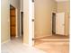 Bright hallway with tile flooring and access to bedrooms and bath at 7456 W Greer Ave, Peoria, AZ 85345