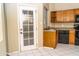 Kitchen area with door leading to the backyard at 7456 W Greer Ave, Peoria, AZ 85345