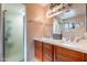 Double sink bathroom with a large shower at 7764 N 19Th Dr, Phoenix, AZ 85021