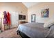 Main bedroom with large TV, plenty of light, and closet space at 7764 N 19Th Dr, Phoenix, AZ 85021