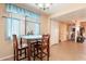 Cozy dining area with small table and chairs, near kitchen at 7764 N 19Th Dr, Phoenix, AZ 85021