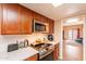 Bright kitchen with stainless steel range and microwave at 7764 N 19Th Dr, Phoenix, AZ 85021