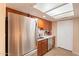 Clean kitchen featuring stainless steel appliances and wood cabinets at 7764 N 19Th Dr, Phoenix, AZ 85021