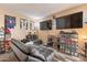 Living room with couches and shoe storage at 7764 N 19Th Dr, Phoenix, AZ 85021