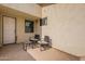 Small patio with two chairs and a table at 7764 N 19Th Dr, Phoenix, AZ 85021