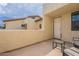 Small patio with chairs, table, and building view at 7764 N 19Th Dr, Phoenix, AZ 85021