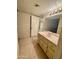 Bathroom with vanity, sink, and access to other rooms at 7777 E Main St # 215, Scottsdale, AZ 85251