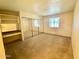 Bedroom with mirrored closet doors and vanity at 7777 E Main St # 215, Scottsdale, AZ 85251