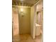 Clean hallway with access to two bathrooms at 7777 E Main St # 215, Scottsdale, AZ 85251