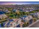 Aerial view of homes showcasing landscape and a neighborhood setting at 813 E Verde Blvd, Queen Creek, AZ 85140