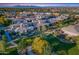 Aerial view of community with various houses and green landscape at 813 E Verde Blvd, Queen Creek, AZ 85140