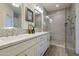 Spa-like bathroom with double vanity, large shower, and mosaic tile accents at 813 E Verde Blvd, Queen Creek, AZ 85140