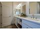 Bright bathroom with double vanity and modern fixtures at 813 E Verde Blvd, Queen Creek, AZ 85140