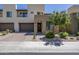 Two-story home with modern design and attached garage at 813 E Verde Blvd, Queen Creek, AZ 85140