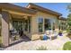 Covered patio perfect for outdoor dining and relaxation at 813 E Verde Blvd, Queen Creek, AZ 85140