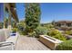 Relaxing patio with fire pit and seating area at 813 E Verde Blvd, Queen Creek, AZ 85140