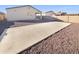 Large backyard with a spacious concrete patio area at 8148 W Atlantis Way, Phoenix, AZ 85043