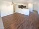 Bright dining area with wood-look flooring and kitchen views at 8148 W Atlantis Way, Phoenix, AZ 85043