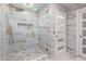 Luxury bathroom with marble tile and gold fixtures at 850 E Del Rio St, Chandler, AZ 85225