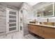 Modern bathroom with dual vanities and a large mirror at 850 E Del Rio St, Chandler, AZ 85225