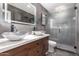 Contemporary bathroom with a frameless shower and vessel sinks at 850 E Del Rio St, Chandler, AZ 85225