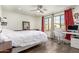 Spacious bedroom with a queen-size bed and a workspace at 850 E Del Rio St, Chandler, AZ 85225