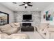 Living room with sectional sofa, fireplace, and TV at 850 E Del Rio St, Chandler, AZ 85225