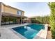 Luxury backyard pool with covered patio and expansive decking at 850 E Del Rio St, Chandler, AZ 85225