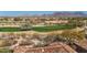 Aerial view of community with golf course and mountain views at 8534 E Angel Spirit Dr, Scottsdale, AZ 85255