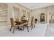 Spacious dining room with a modern wooden table and neutral color palette at 8534 E Angel Spirit Dr, Scottsdale, AZ 85255