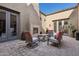 Spacious patio with seating and a fireplace at 8534 E Angel Spirit Dr, Scottsdale, AZ 85255