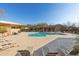 Inviting community pool with lounge chairs and shade umbrellas at 8534 E Angel Spirit Dr, Scottsdale, AZ 85255